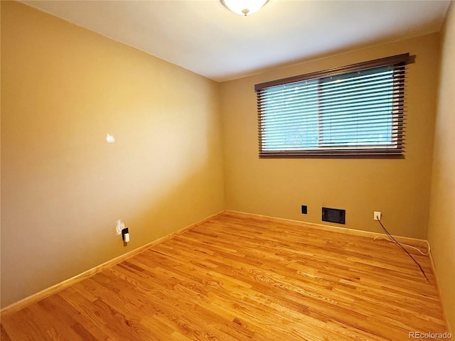 8930 W 55th Ave, Arvada, CO 80002 - empty room featuring light wood-type flooring and baseboards