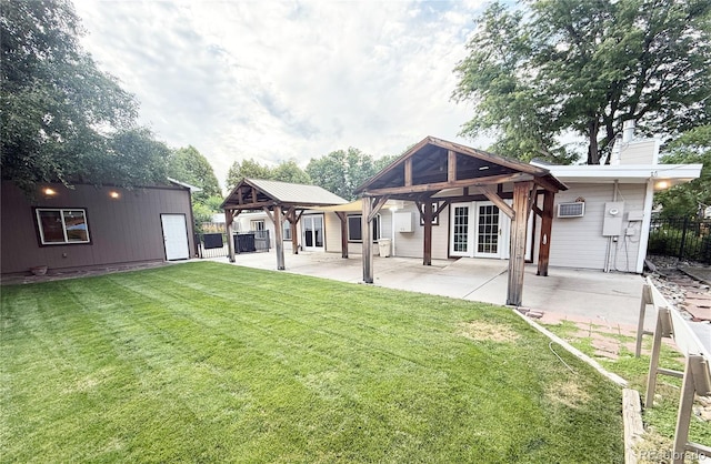 8930 W 55th Ave, Arvada, CO 80002 - rear view of house with a gazebo, a patio, a chimney, and french doors