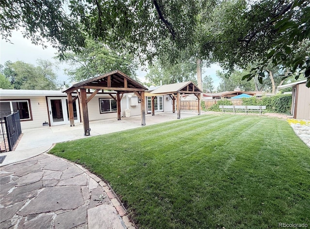 8930 W 55th Ave, Arvada, CO 80002 - view of yard featuring a gazebo and a patio area