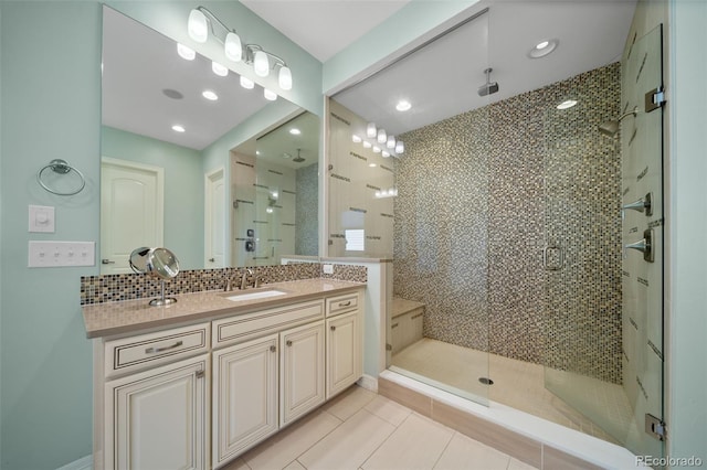 23615 E Del Norte Pl, Aurora, CO 80016 - full bathroom with a shower stall, vanity, tile patterned floors, and recessed lighting