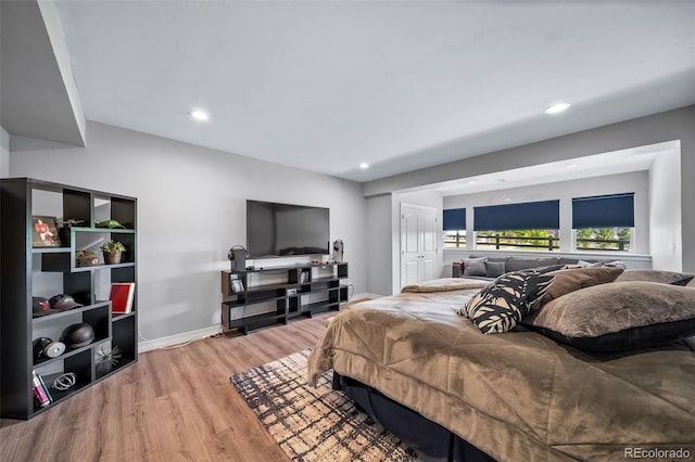 23615 E Del Norte Pl, Aurora, CO 80016 - bedroom featuring light wood-type flooring, recessed lighting, and a closet
