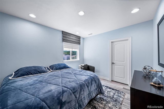 23615 E Del Norte Pl, Aurora, CO 80016 - bedroom featuring light wood finished floors and recessed lighting