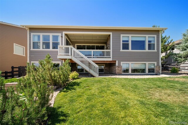 23615 E Del Norte Pl, Aurora, CO 80016 - rear view of house with stairway and stone siding