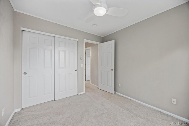 18121 E Adriatic, Aurora, CO 80013 - unfurnished bedroom with carpet, baseboards, a closet, ornamental molding, and ceiling fan