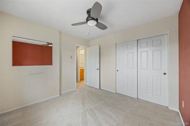 18121 E Adriatic, Aurora, CO 80013 - unfurnished bedroom with light colored carpet, baseboards, and a closet