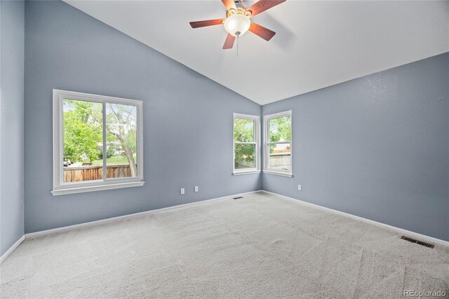 18121 E Adriatic, Aurora, CO 80013 - carpeted spare room with lofted ceiling, a ceiling fan, and baseboards