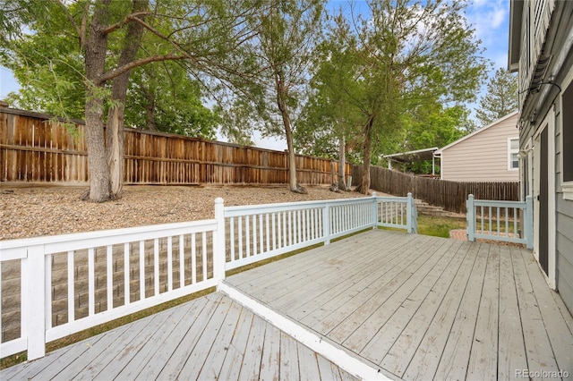 18121 E Adriatic, Aurora, CO 80013 - wooden deck with a fenced backyard