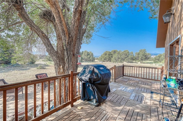 wooden deck with area for grilling