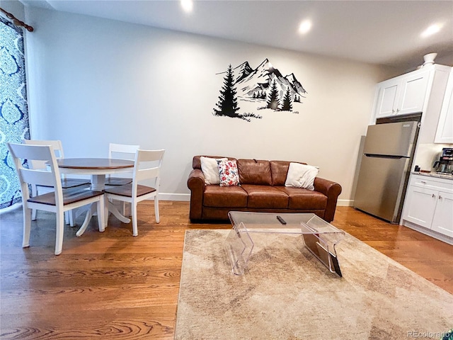 824 Grand Ave Unit 110, Grand Lake, CO 80447 - living room with light wood-type flooring, recessed lighting, and baseboards