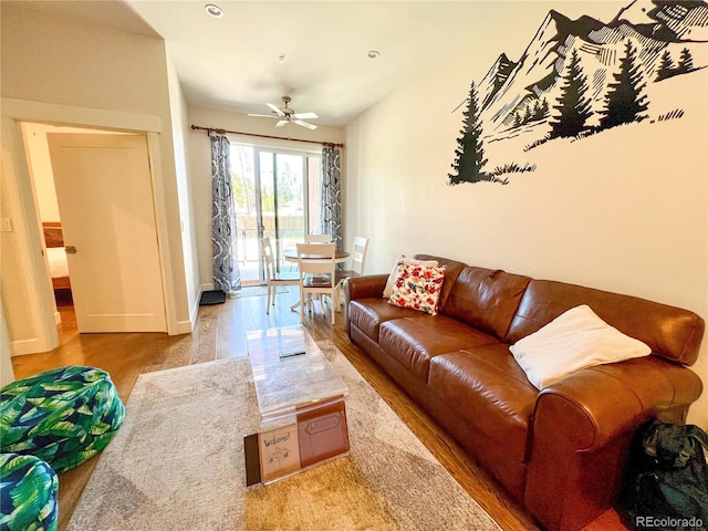 824 Grand Ave Unit 110, Grand Lake, CO 80447 - living area with wood finished floors, a ceiling fan, and baseboards