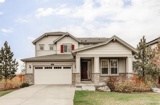 500 176th Ave, Broomfield, CO 80023 - craftsman-style home with fence, roof with shingles, stone siding, a garage, and driveway