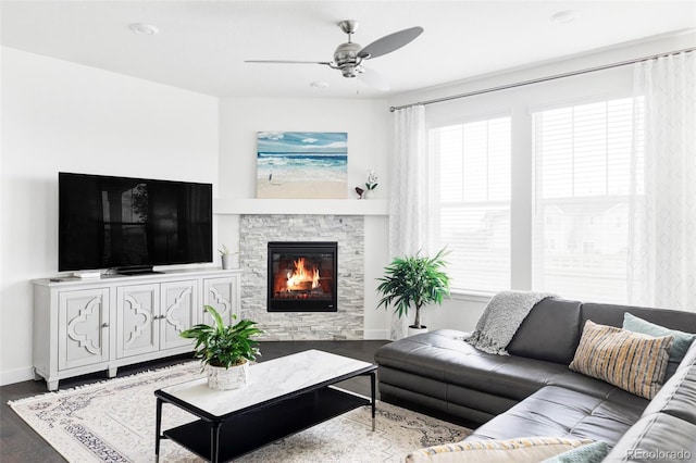 500 176th Ave, Broomfield, CO 80023 - living area with baseboards, ceiling fan, a fireplace, and wood finished floors