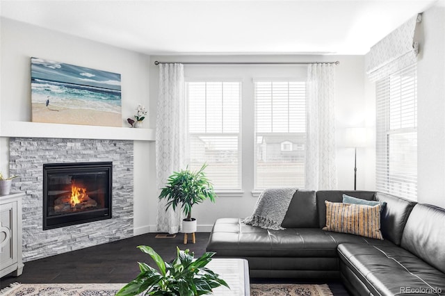 500 176th Ave, Broomfield, CO 80023 - living area featuring a stone fireplace and wood finished floors