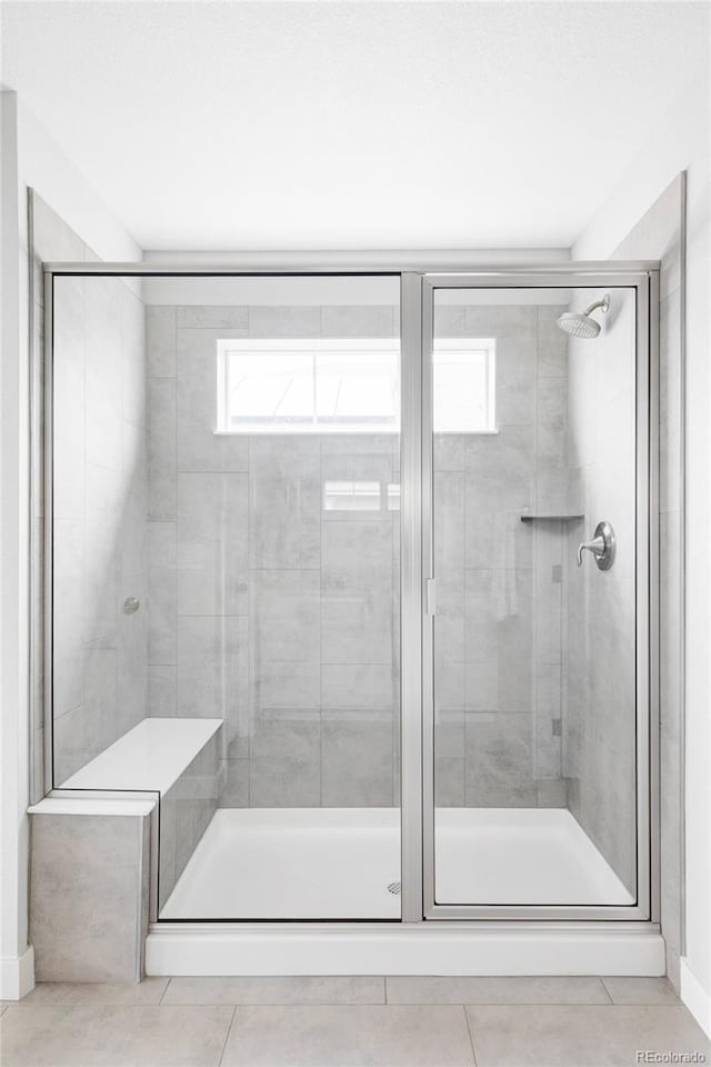 500 176th Ave, Broomfield, CO 80023 - full bathroom featuring tile patterned flooring and a stall shower