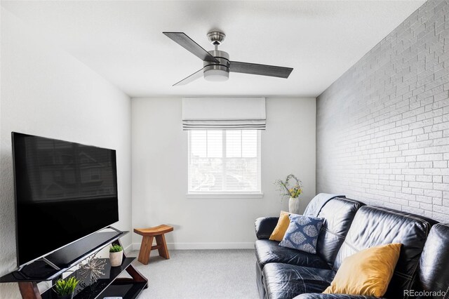 500 176th Ave, Broomfield, CO 80023 - living room featuring carpet flooring, a ceiling fan, and brick wall