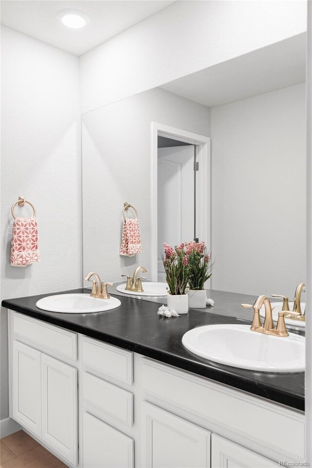 500 176th Ave, Broomfield, CO 80023 - bathroom featuring a sink, tile patterned floors, and double vanity