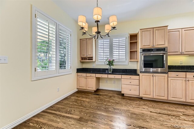85 Silver Fox Dr, Greenwood Village, CO 80121 - kitchen with oven, light brown cabinets, open shelves, a chandelier, and dark wood finished floors