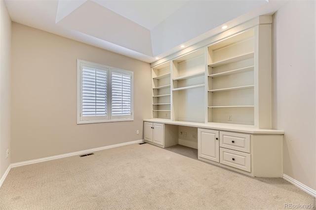 85 Silver Fox Dr, Greenwood Village, CO 80121 - unfurnished office featuring light carpet, baseboards, and built in study area