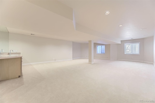 85 Silver Fox Dr, Greenwood Village, CO 80121 - basement with light carpet, baseboards, recessed lighting, and a sink