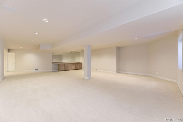 85 Silver Fox Dr, Greenwood Village, CO 80121 - finished below grade area featuring baseboards, light carpet, recessed lighting, and bar