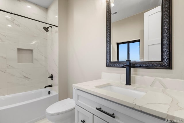 16250 Kenosha St, Brighton, CO 80603 - bathroom featuring vanity, bathing tub / shower combination, toilet, and visible vents