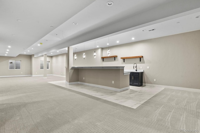 16250 Kenosha St, Brighton, CO 80603 - bar featuring baseboards, light colored carpet, recessed lighting, hanging light fixtures, and a sink