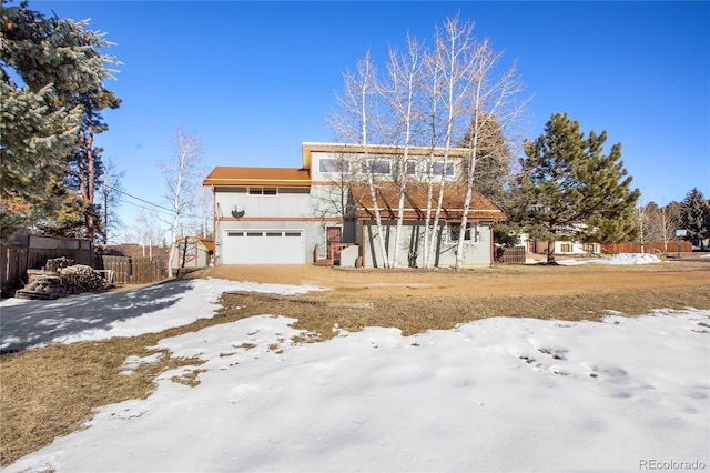 view of front of property with a garage