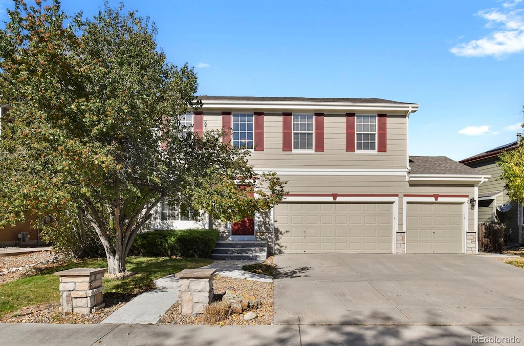 view of front property with a garage