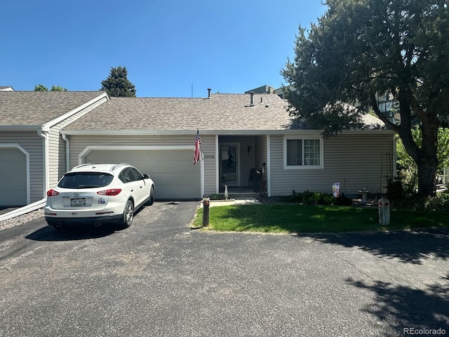 13908 E Linvale Pl, Aurora, CO 80014 - single story home with asphalt driveway, a garage, and roof with shingles