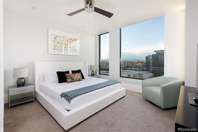 bedroom featuring carpet flooring and ceiling fan