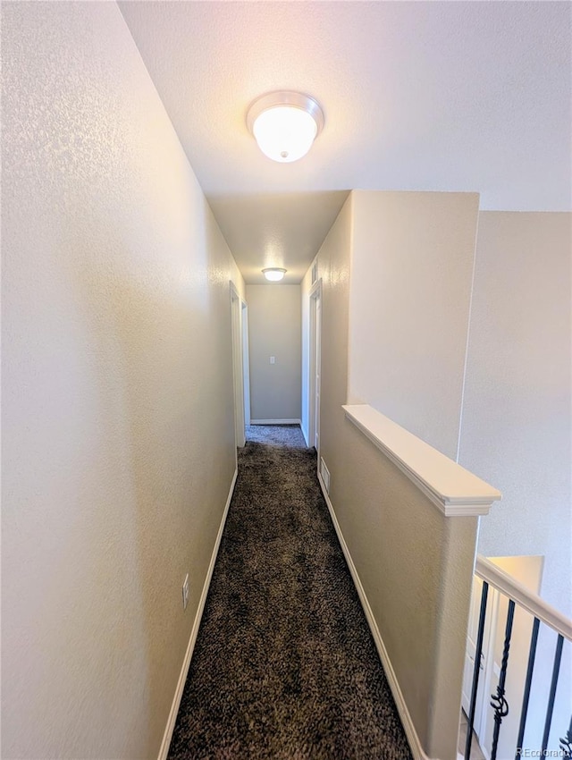 7958 Lightwood Way, Colorado Springs, CO 80908 - corridor with an upstairs landing, baseboards, and carpet