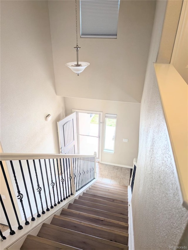 7958 Lightwood Way, Colorado Springs, CO 80908 - staircase with wood finished floors