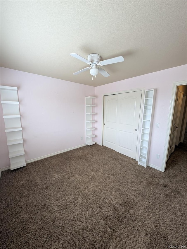 7958 Lightwood Way, Colorado Springs, CO 80908 - unfurnished bedroom featuring carpet floors, a closet, baseboards, a ceiling fan, and a textured ceiling