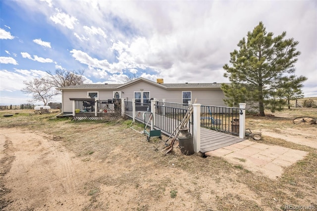 7080 S Calhan Rd, Calhan, CO 80808 - back of property featuring a wooden deck