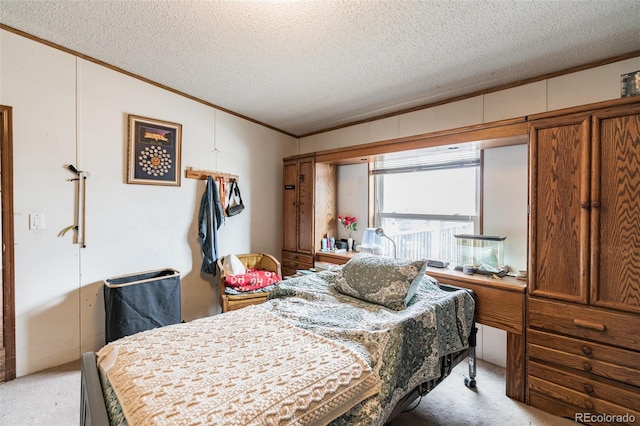 7080 S Calhan Rd, Calhan, CO 80808 - bedroom with light colored carpet, crown molding, and a textured ceiling