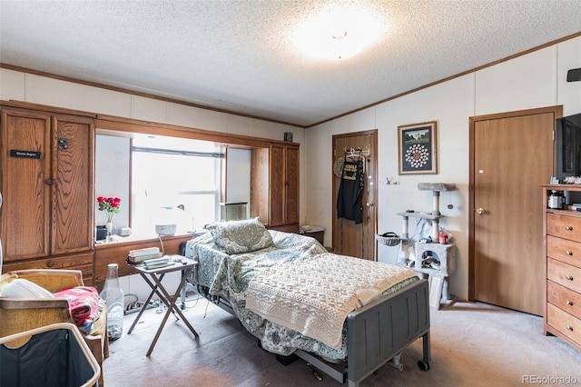 7080 S Calhan Rd, Calhan, CO 80808 - bedroom featuring light carpet, crown molding, a textured ceiling, and vaulted ceiling