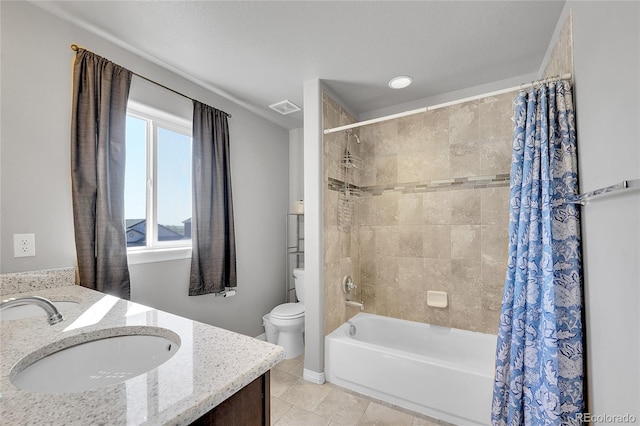 bathroom featuring vanity, shower / tub combo with curtain, tile patterned floors, toilet, and visible vents