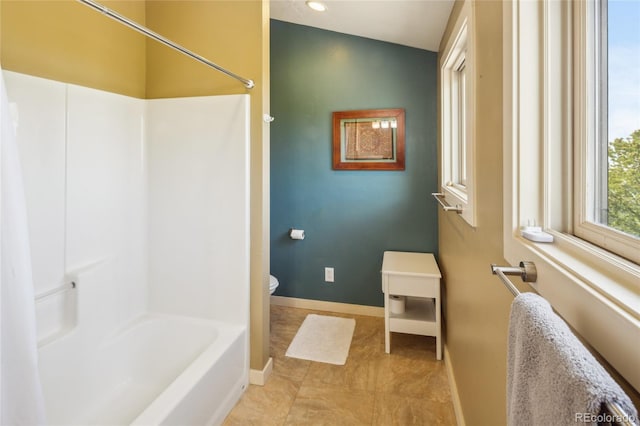 147 Moonlight Way, Crestone, CO 81131 - bathroom featuring baseboards, toilet, tub / shower combination, recessed lighting, and tile patterned flooring