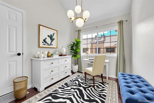 office area with a chandelier, dark wood-style floors, lofted ceiling, and baseboards
