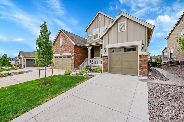 craftsman-style home featuring a porch, a garage, central AC, and a front lawn