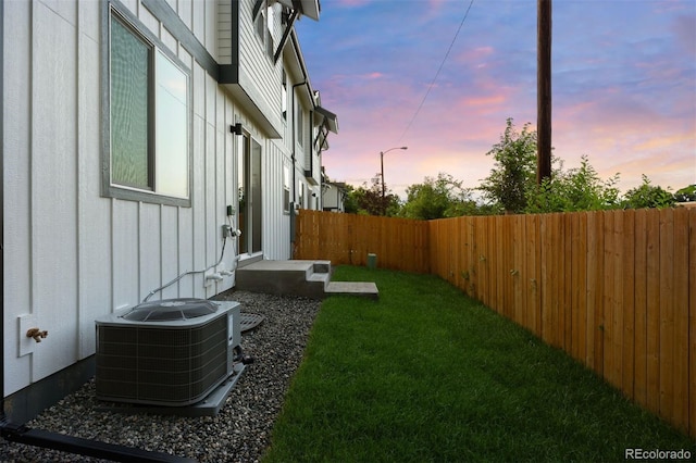4008 Upham St, Wheat Ridge, CO 80033 - yard at dusk with a fenced backyard