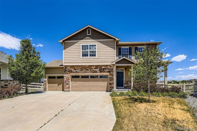 5841 Echo Park Cir, Castle Rock, CO 80104 - view of front of property with driveway, stone siding, and a garage