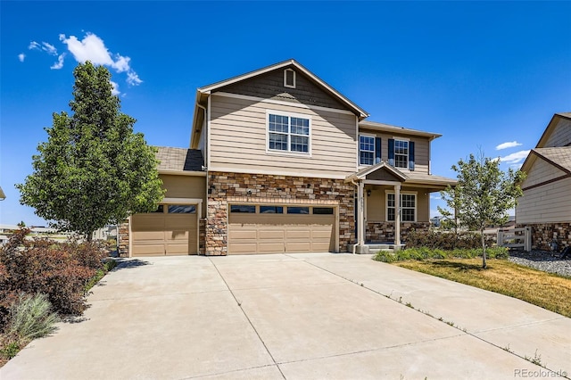 5841 Echo Park Cir, Castle Rock, CO 80104 - view of front of property with driveway, stone siding, a garage, and a porch