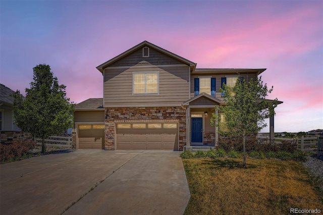 5841 Echo Park Cir, Castle Rock, CO 80104 - view of front facade featuring driveway, stone siding, and a garage