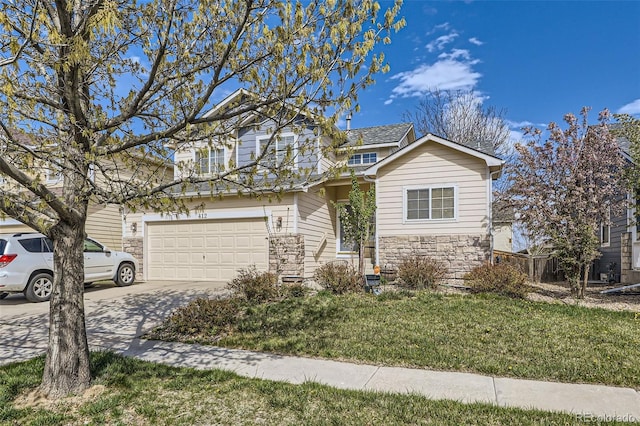 412 Iron St, Brighton, CO 80603 - view of front facade featuring stone siding, driveway, a front yard, and a garage