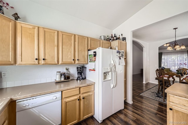 412 Iron St, Brighton, CO 80603 - kitchen with white appliances, a chandelier, arched walkways, dark wood-style flooring, and lofted ceiling