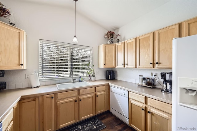 412 Iron St, Brighton, CO 80603 - kitchen featuring white appliances, light brown cabinets, vaulted ceiling, light countertops, and pendant lighting