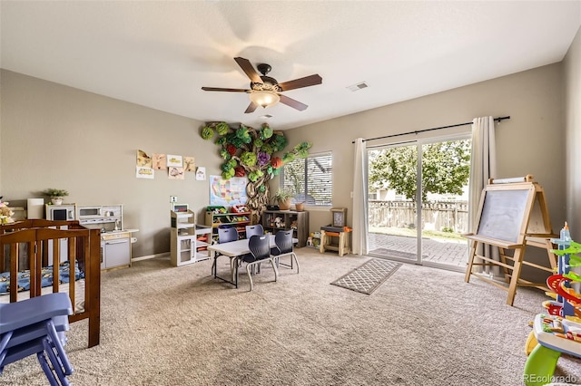 412 Iron St, Brighton, CO 80603 - bedroom featuring carpet flooring, access to outside, and a ceiling fan