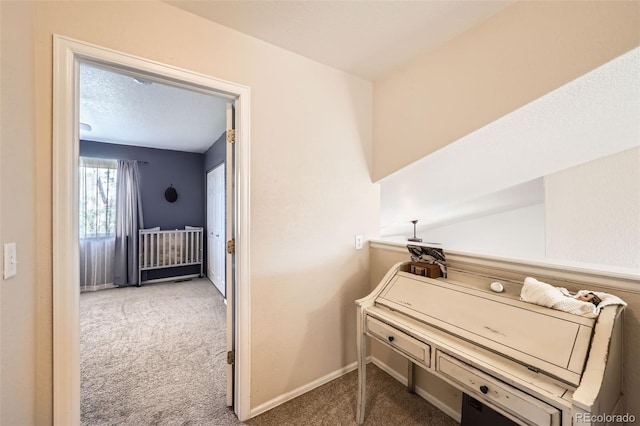 412 Iron St, Brighton, CO 80603 - misc room featuring carpet and baseboards
