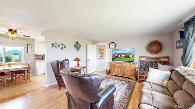 4160 Converse Rd, Bennett, CO 80102 - living room featuring light wood-type flooring and a ceiling fan